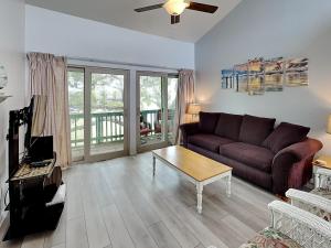 a living room with a couch and a coffee table at A Bay From It All in Rockport