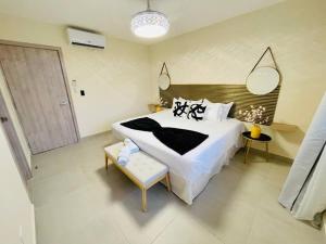 Postel nebo postele na pokoji v ubytování Downtown Punta Cana Villa