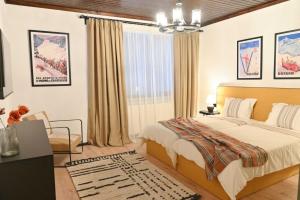 Postel nebo postele na pokoji v ubytování Marand Boutique Apartments