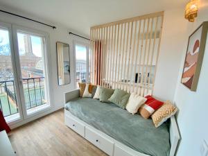 Гостиная зона в L'Escale Appartements et Suites en bord de Mer