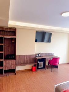TV a/nebo společenská místnost v ubytování SM HOTEL Plus