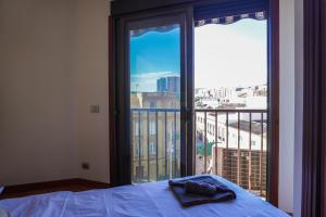 Postel nebo postele na pokoji v ubytování City Center Modern Apartment