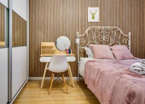 Katil atau katil-katil dalam bilik di NiceApart near Old Town +4 gambar