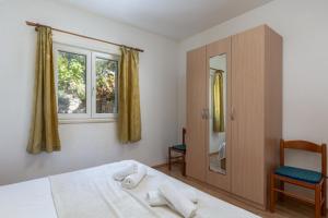 Postel nebo postele na pokoji v ubytování House Rasica + 38 fotografií