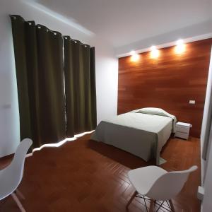 Postel nebo postele na pokoji v ubytování L'Attico di Matilde + 24 fotografií