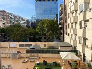 a view of a courtyard in a city with buildings at 3 bedrooms appartement with wifi at Valencia 3 km away from the beach in Valencia