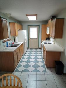 Η κουζίνα ή μικρή κουζίνα στο Oakhaven Annex
