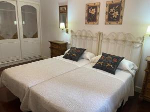 Postel nebo postele na pokoji v ubytování Hotel Kaia