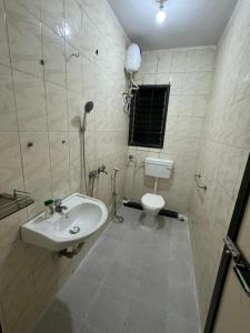 Koupelna v ubytování Shivahospitality