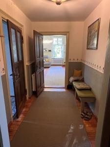 a hallway with a door leading to a living room at Villa Lattermann in Muldenhammer