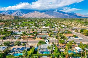 an aerial view of a resort with mountains in the background at The Dexter Palm Springs- 1480 in Palm Springs