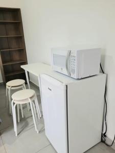 Vô Pedrinho的厨房或小厨房