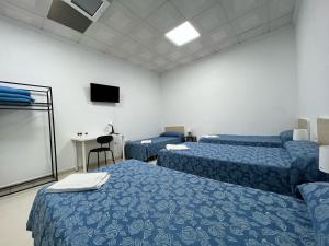 TV a/nebo společenská místnost v ubytování Hostal Kaizen