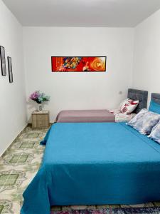Postel nebo postele na pokoji v ubytování Guest House Ergest