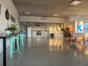 Kuchyň nebo kuchyňský kout v ubytování Hostal Kaizen