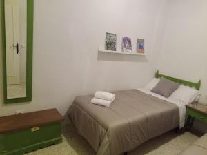 En eller flere senge i et værelse på Playa de Madrid
