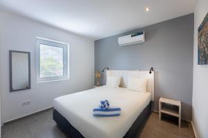 Letto o letti in una camera di Palm Crest