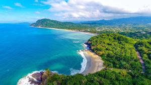 an aerial view of a beach and the ocean at Loft Playa Los Venados in Lo de Marcos