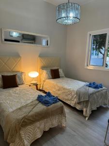 Postel nebo postele na pokoji v ubytování Dream Maday