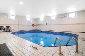 a large swimming pool in a building at Quality Inn Downtown Inner Harbour in Victoria