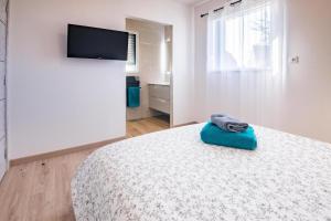 Ein Bett oder Betten in einem Zimmer der Unterkunft Villa Plain-Pied Vue Mer