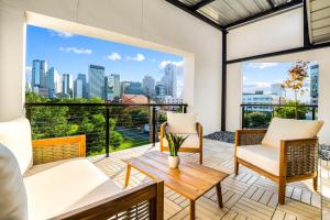 a balcony with a view of the city at Ellum House in Dallas