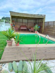 Bazén v ubytování Cabaña Soñada con vista al mar nebo v jeho okolí