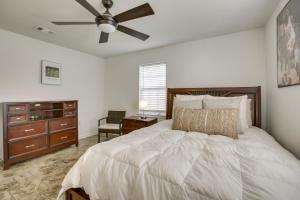 a bedroom with a bed and a ceiling fan at New Orleans Retreat about 7 Mi to French Quarter! in New Orleans