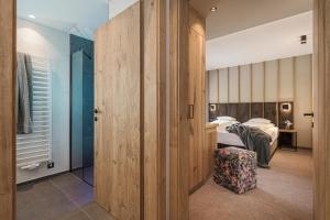 Jagdhof PURE Mountain Appartementsにあるベッド