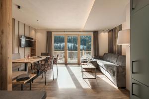 Predel za sedenje v nastanitvi Jagdhof PURE Mountain Appartements