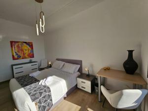 En eller flere senge i et værelse på La Finestra sul Porto