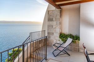 a balcony with a view of the water at Villa Jana in Marusici 