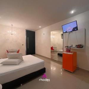 Tempat tidur dalam kamar di Rhodes Hotel Caruaru