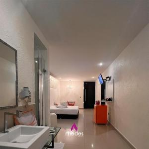 Ein Badezimmer in der Unterkunft Rhodes Hotel Caruaru