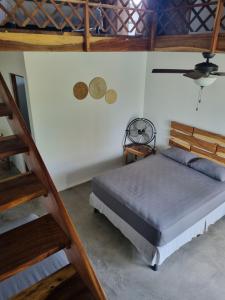 Postel nebo postele na pokoji v ubytování Gecko Hotel