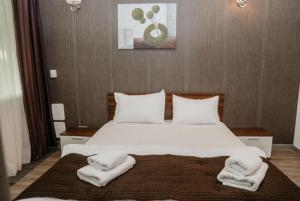 Giường trong phòng chung tại Silver Mountain, Poiana Brasov - Forest Crib +6 ảnh