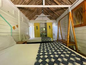 Postel nebo postele na pokoji v ubytování Hotel Las Casitas De Mar Adentro