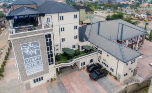 an aerial view of a hotel with a building at Vinpy hotels in Uyo