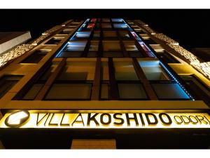 a building with a sign on the side of it at VILLA KOSHIDO ODORI - Vacation STAY 04748v in Sapporo