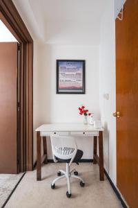 an office with a white desk and a chair at affordable little private room, Polanco :) in Mexico City