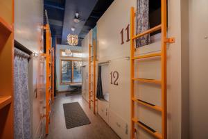 a hallway of a house with wooden shelves at The Bunkhouse in Minturn