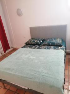 Postel nebo postele na pokoji v ubytování Baie du Galion Tartane
