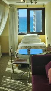 Rúm í herbergi á Hotel Restaurante Ankara