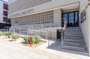 a building with the entrance to the corazon center at Luxurious Apartment With Two Bedrooms in Asuncion