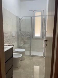 Kylpyhuone majoituspaikassa Appartamento SORRISO