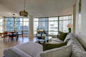 a living room with a couch and a table at Dunowen Properties in Vancouver