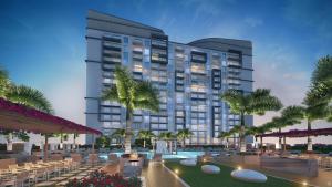 un hotel con piscina y palmeras en Provident Grand Luxury Short-Term Residences en Miami