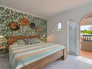Ένα ή περισσότερα κρεβάτια σε δωμάτιο στο Belvilla by OYO Villa Sonrisa