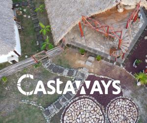 uma vista de cima de uma casa com as palavras em dinheiro em Castaways Nicaragua em Popoyo