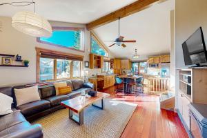 a living room with a couch and a table at Galena Street Getaway in Frisco